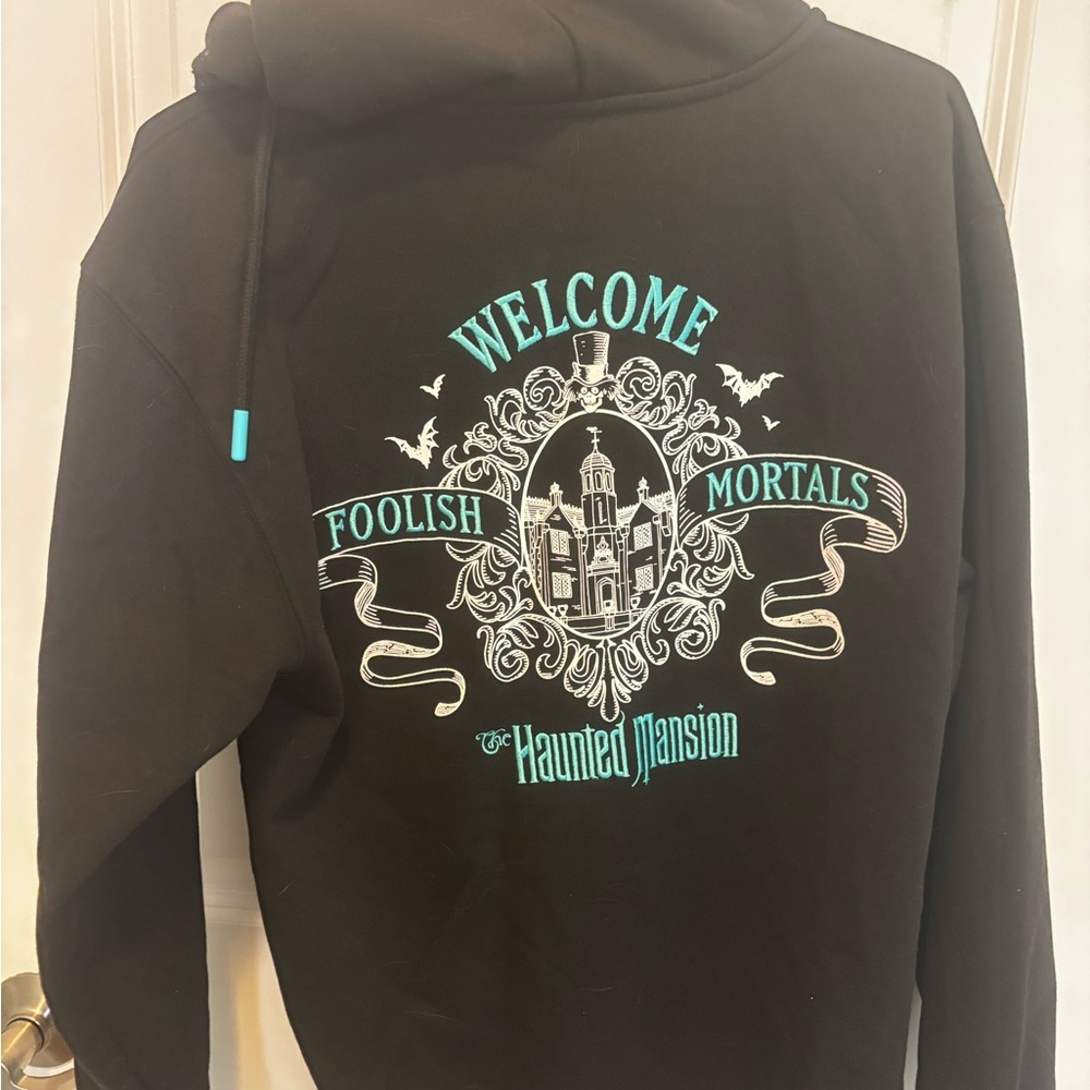 Disney Black Hoodie with Teal Haunted Mansion Emblem EUC Size XS